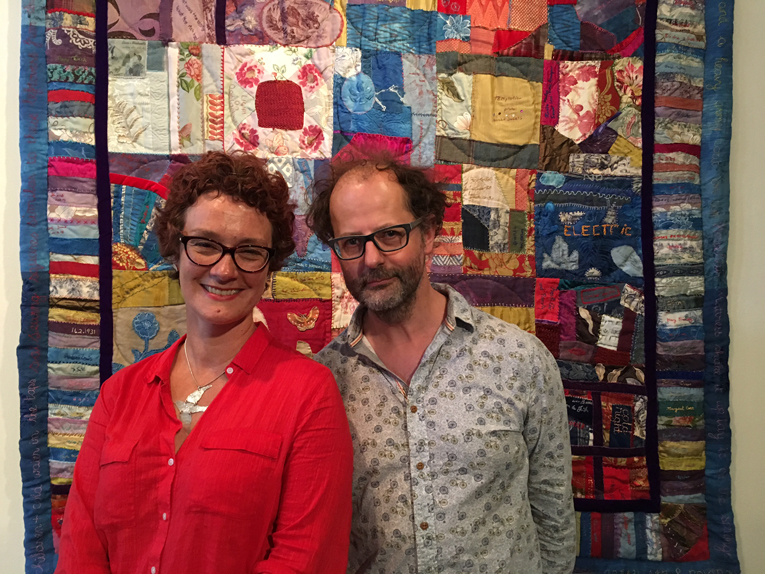 Lois and Phil with Fresh Air &amp; Poverty quilt